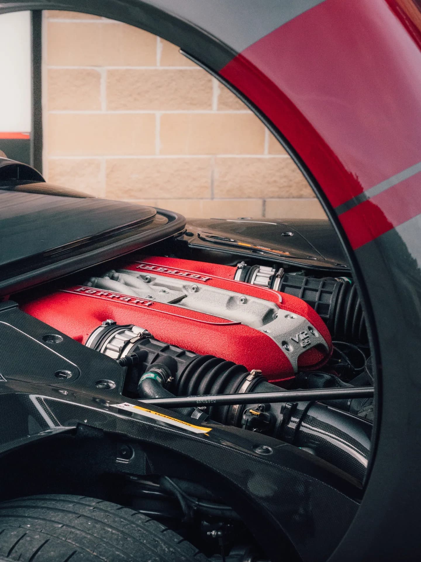 Ferrari V12 6.5 engine bay with Brill-Steel headers